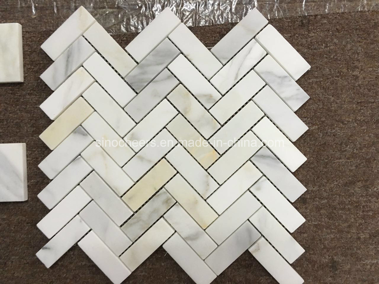 Calacatta Gold White Marble Herringbone Mosaic Tile