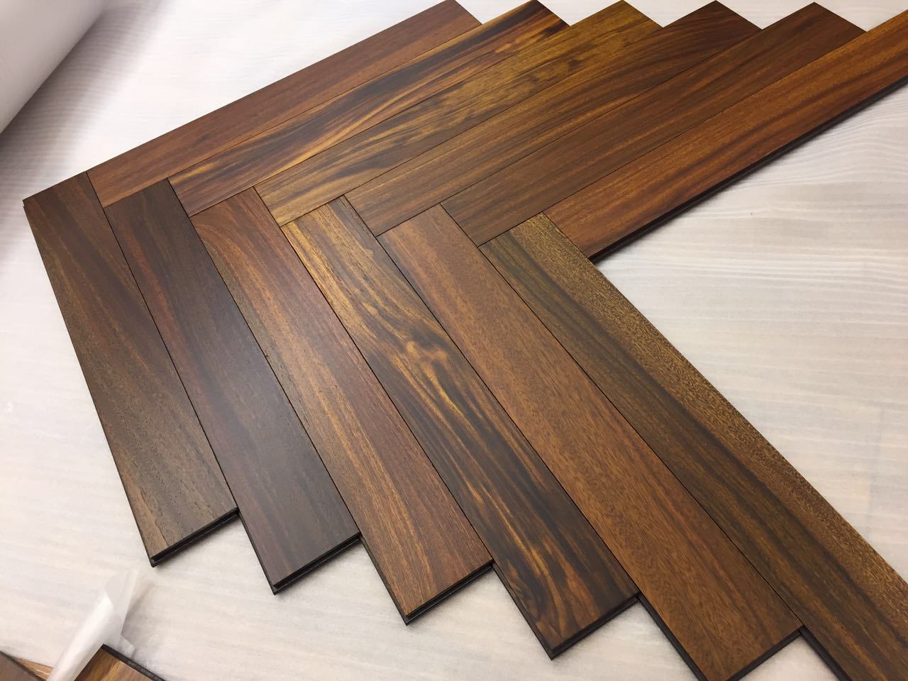 Exotic Tobacco Road African Teak Herringbone Parquet Flooring